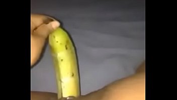ebony teen fucks a banana