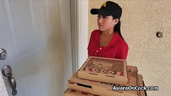 Asian cutie delivering pizza ends up on two cocks
