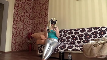 A girl in silver leggings at the webcam is talking to a guy and undressing, showing her hairy pussy and juicy PAWG.