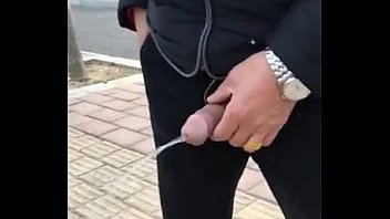 Old man flashes cock outdoors