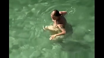 vacation voyeur video:  my aunt naked in the sea