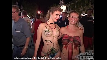 costume cosplay party with girls flashing in the streets of key west