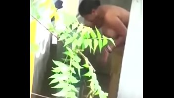 Big boobs Desi bhabhi nude bathing neighbor boy caught by hidden cam