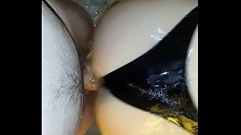 Me fucking my wife's big wet ass in latex strings in shower