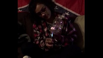 Mexican freak smokes dope under rebel flag