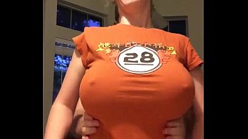 nerd with big tits orange shirt