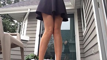 Upskirt milf pees standing on porch